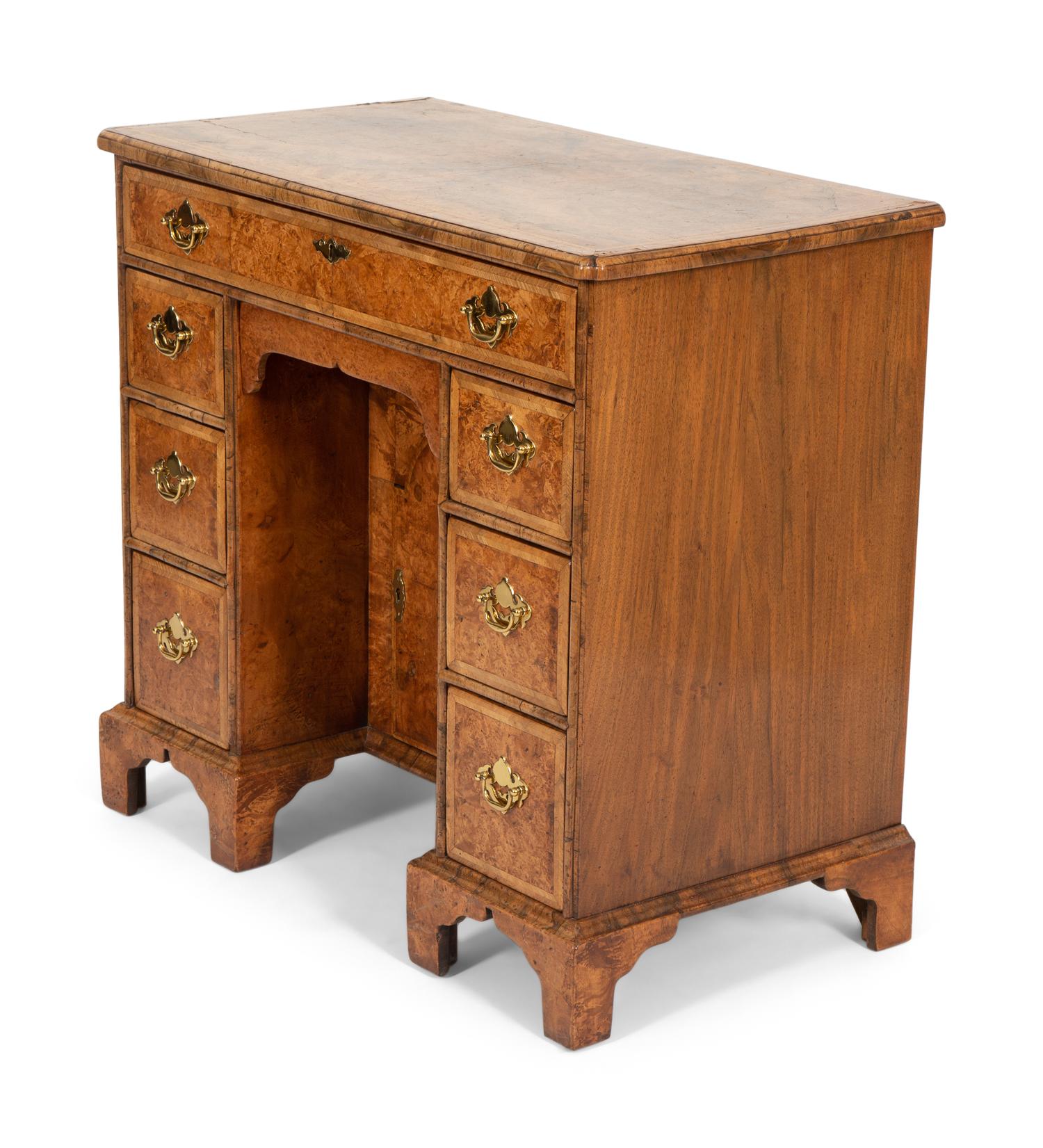 A George II Style Yew and Walnut Kneehole Desk