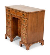 A George II Style Yew and Walnut Kneehole Desk