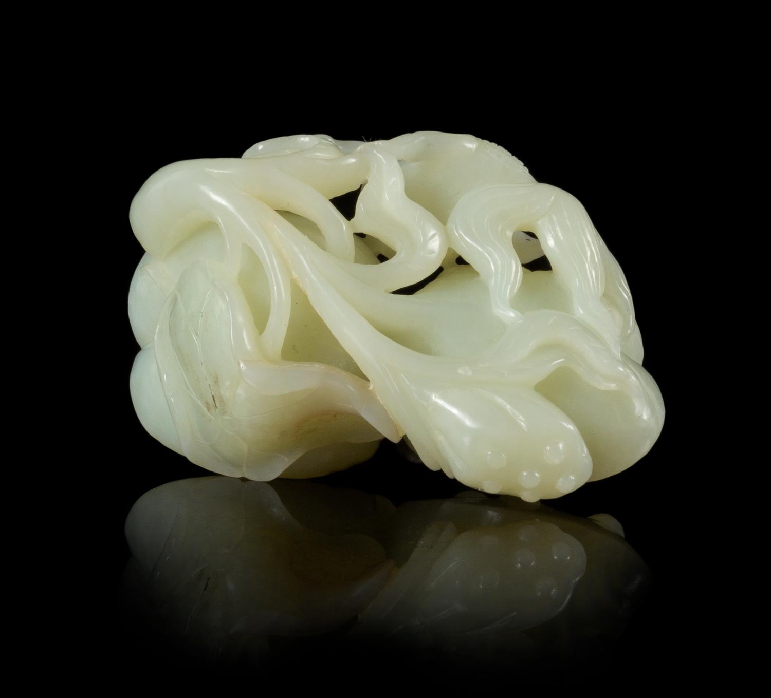 A Pale Celadon Jade Carving Length 3 1/4 inches.