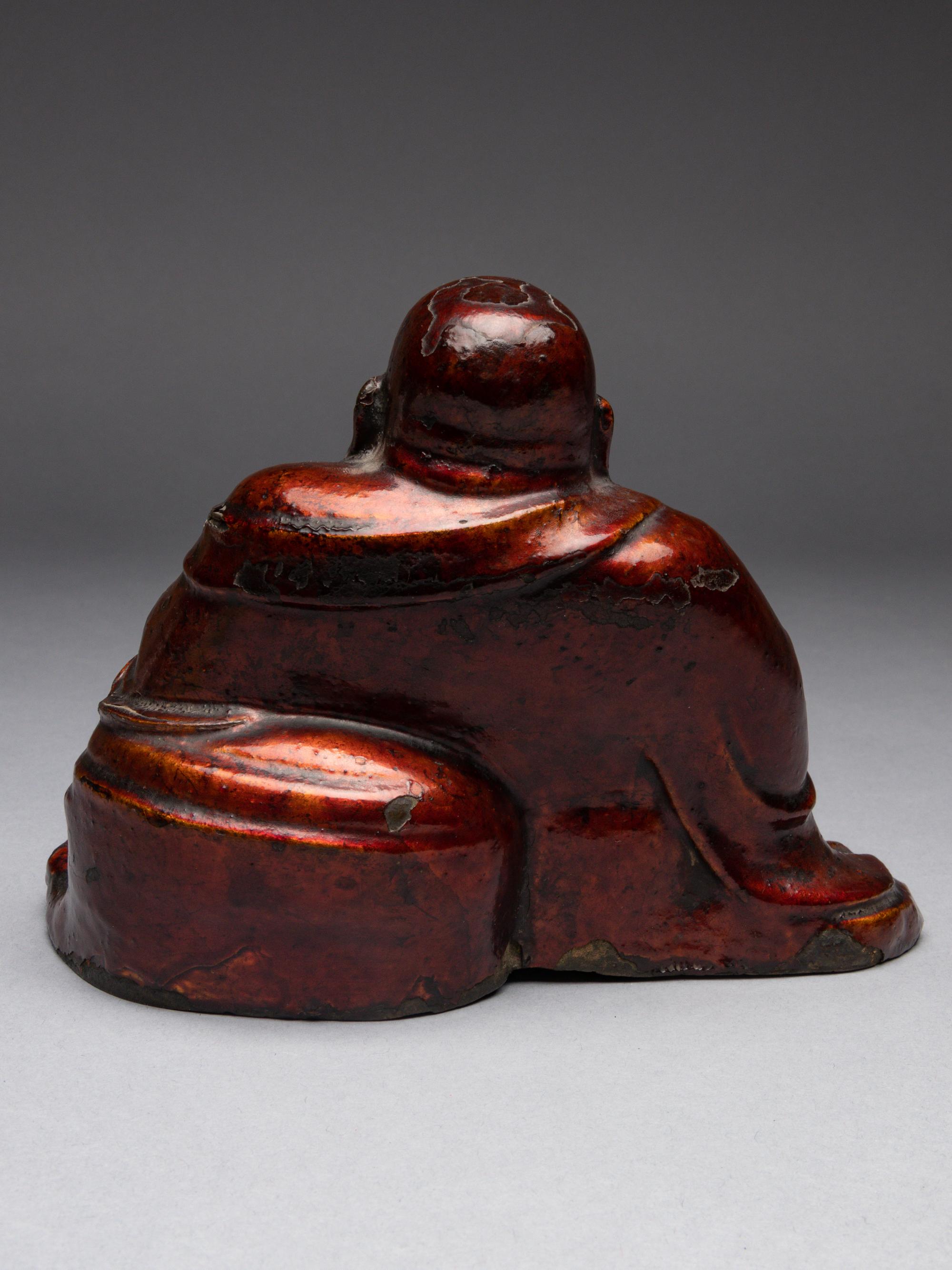 A Lacquered Bronze Figure of Budai Buddha