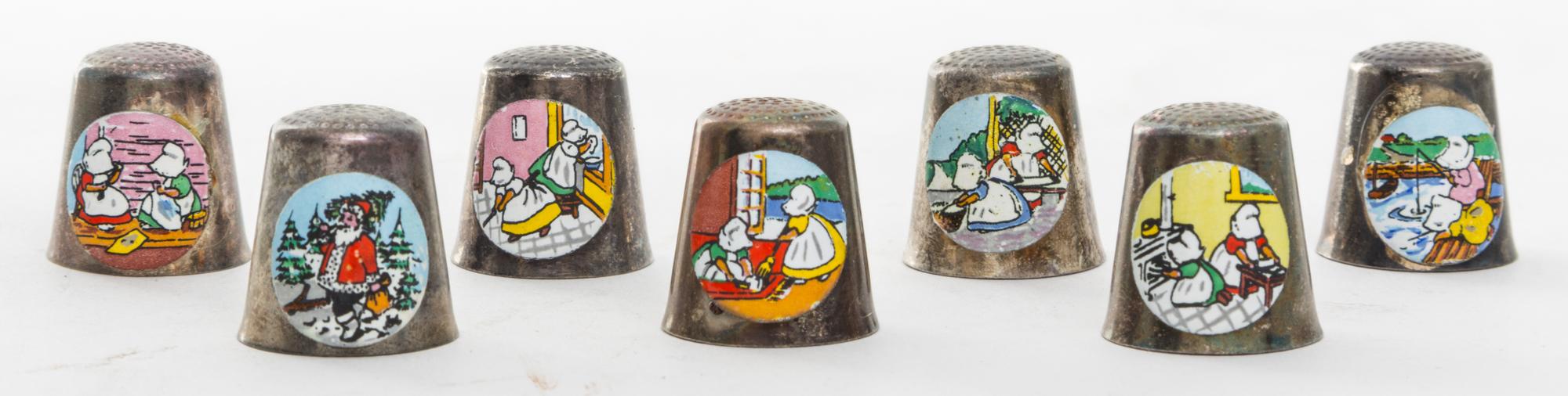 Seven Downs Enameled Silver-plate Thimbles Height of first 7/8 inch.