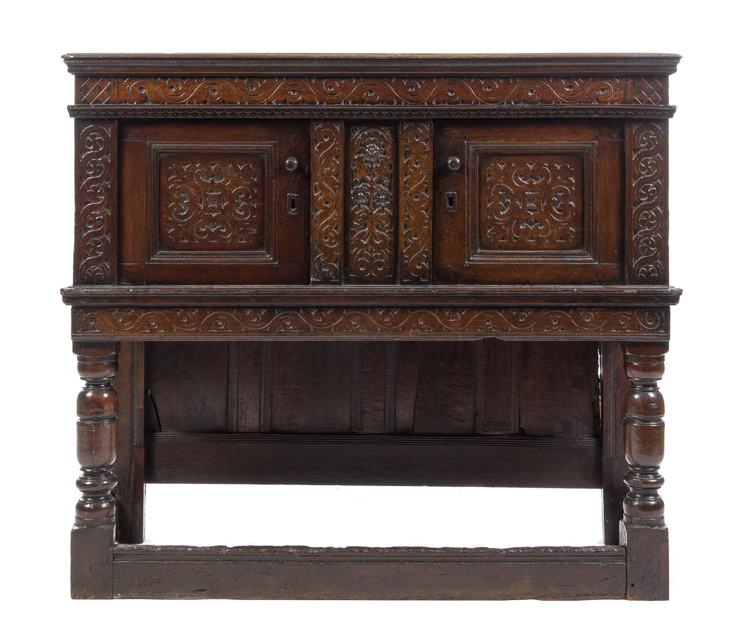 An English Carved Oak Court Cupboard Height 44 x width 50 1/4 x depth 19 inches. — 17TH CENTURY WITH LATER ELEMENTS