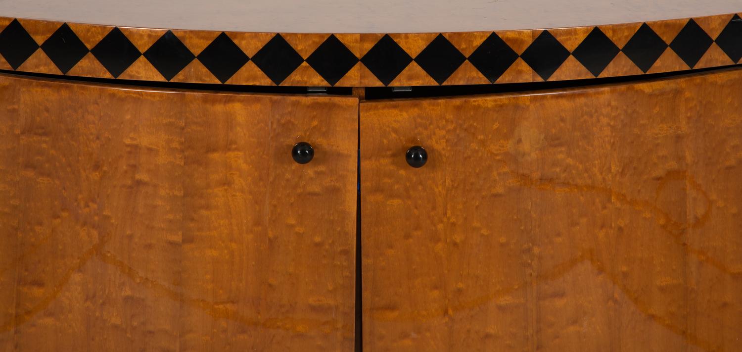 An Art Deco Burl Walnut Bow Front Cabinet