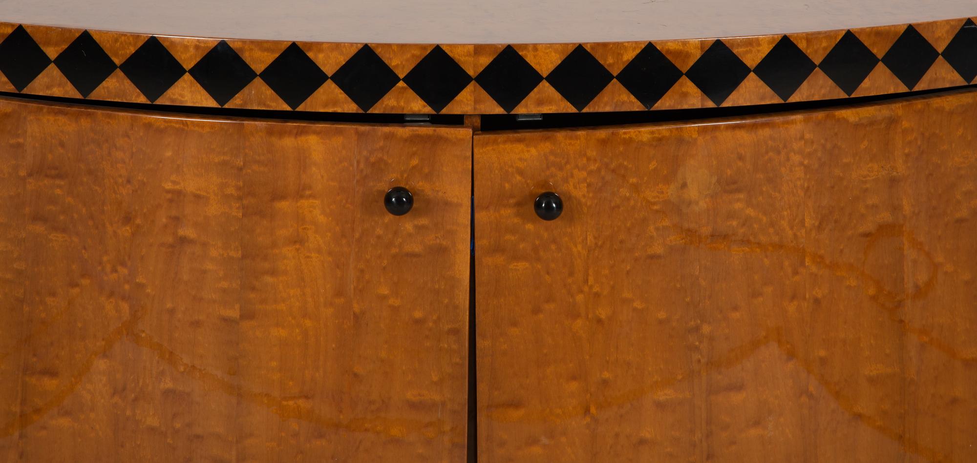 An Art Deco Burl Walnut Bow Front Cabinet