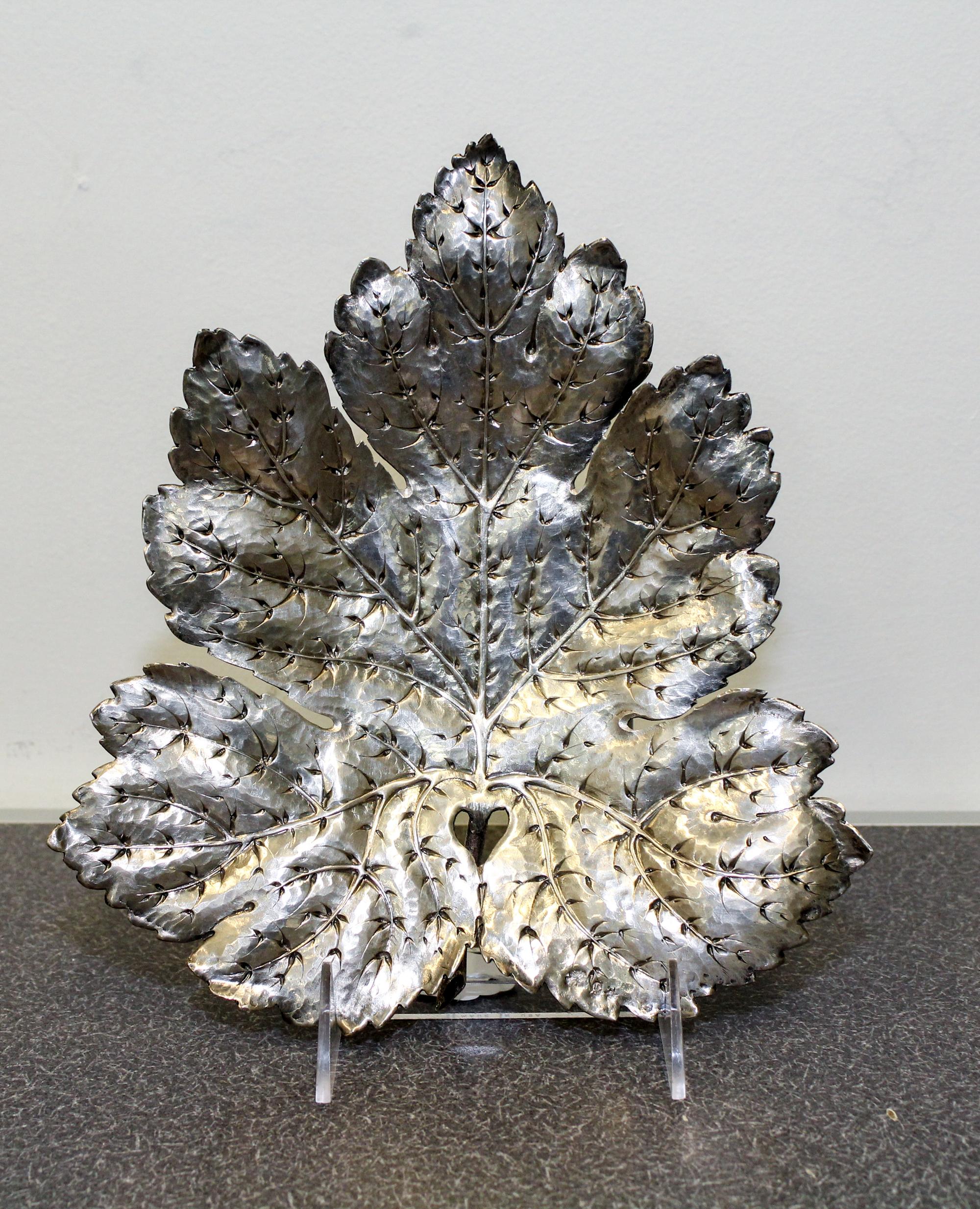 A Continental Silver Dish, maker's marks obscured, in the form of a leaf.