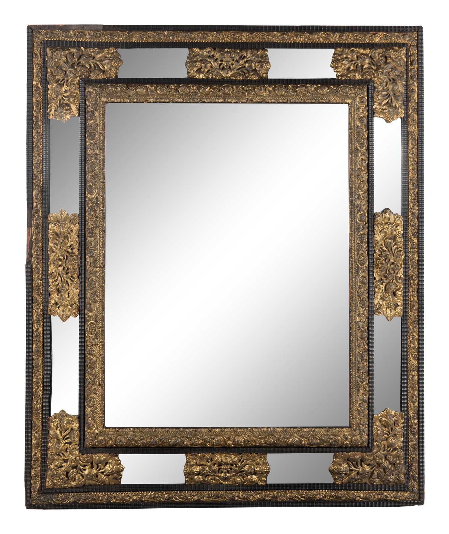 A Dutch Pressed Brass and Part Ebonized Mirror