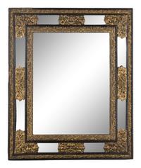 A Dutch Pressed Brass and Part Ebonized Mirror