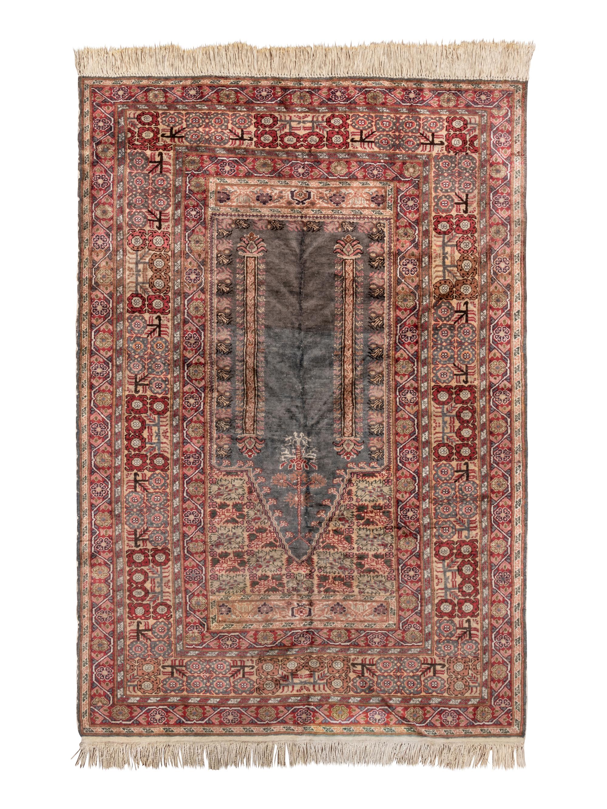 A Turkish Wool Prayer Rug