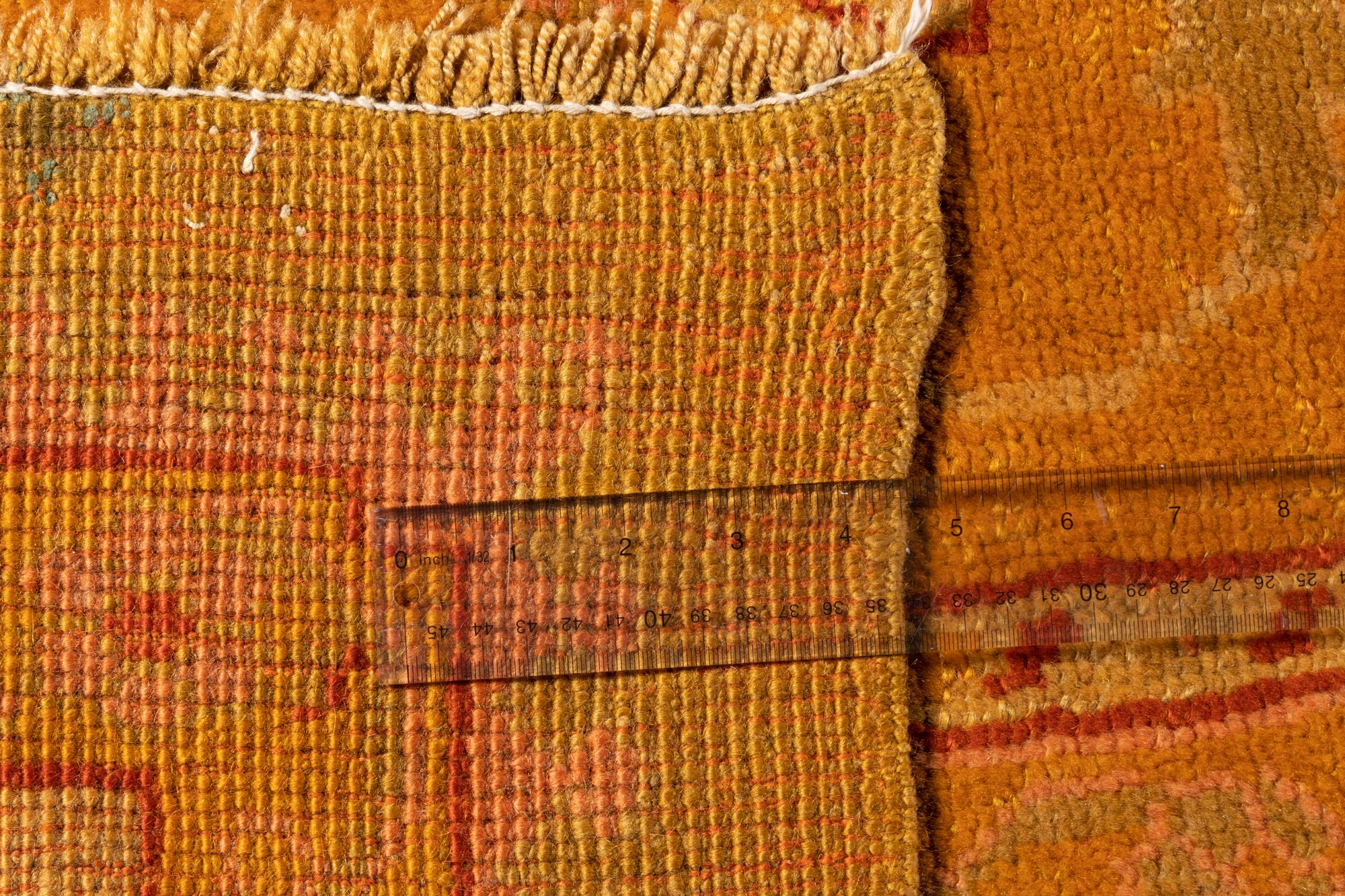 An Oushak Wool Rug