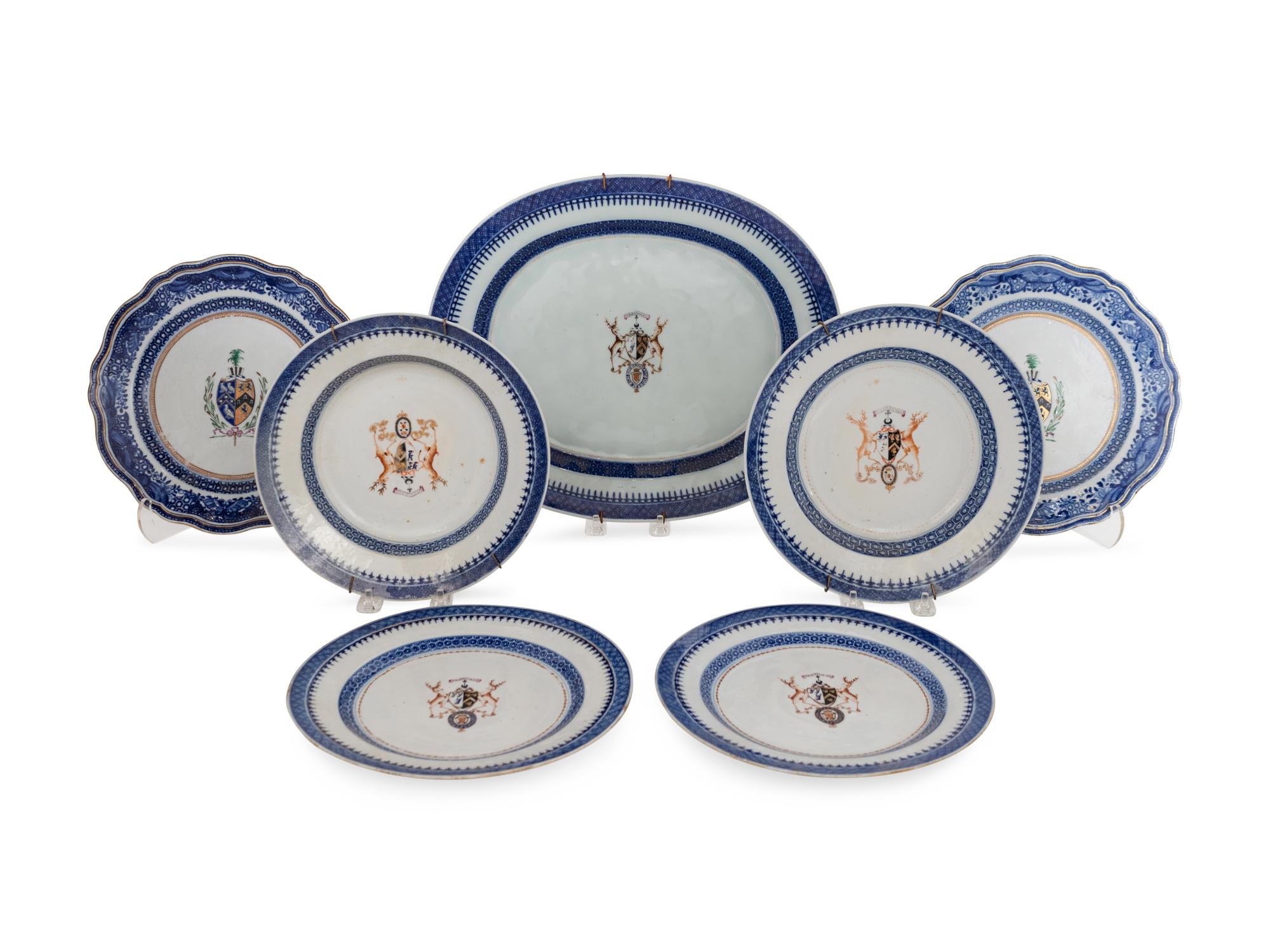 Seven Chinese Export Armorial Porcelain Plates