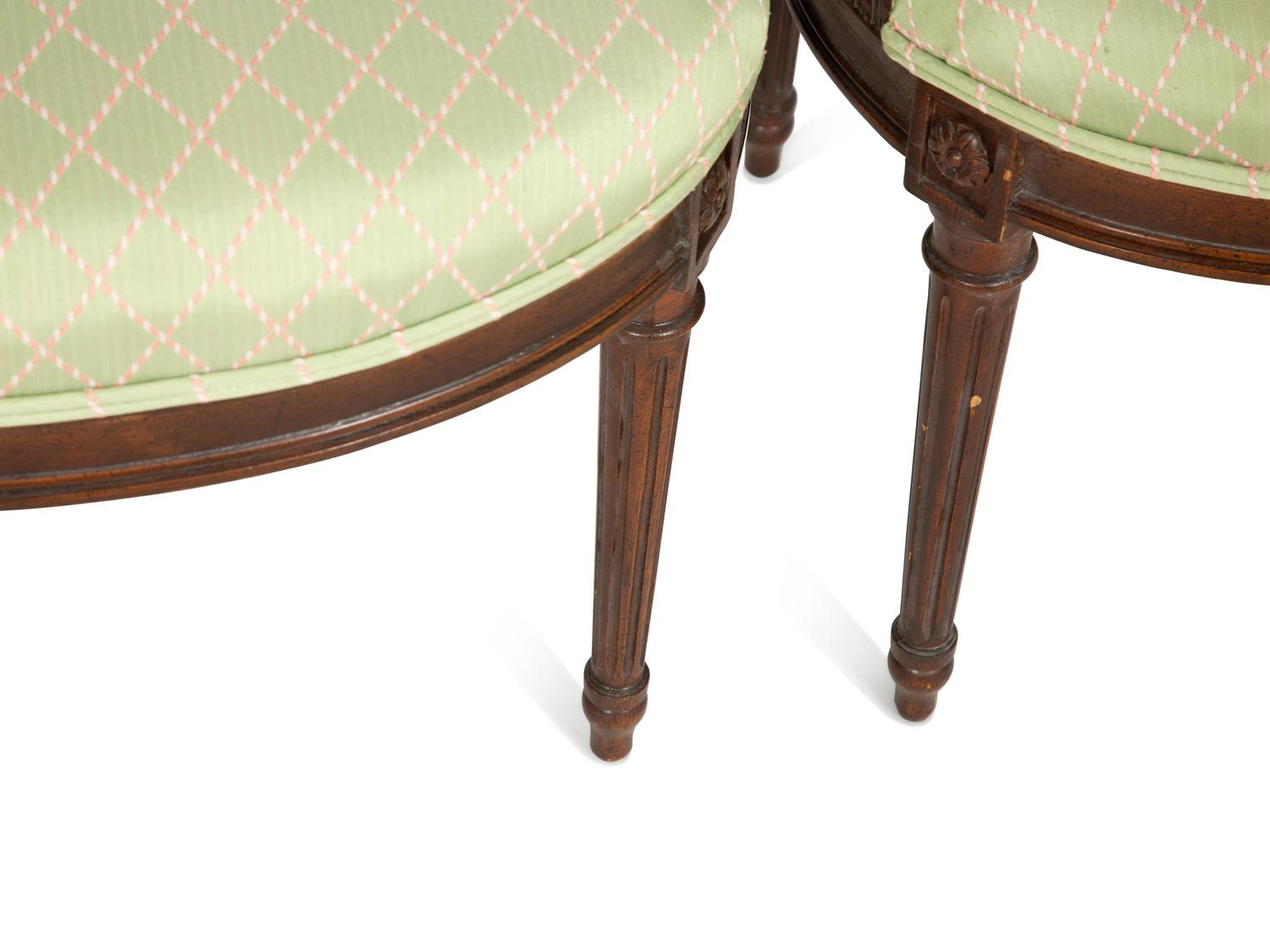 A Set of Four Louis XVI Style Mahogany "Montgolfière" Armchairs