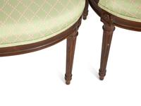 A Set of Four Louis XVI Style Mahogany "Montgolfière" Armchairs