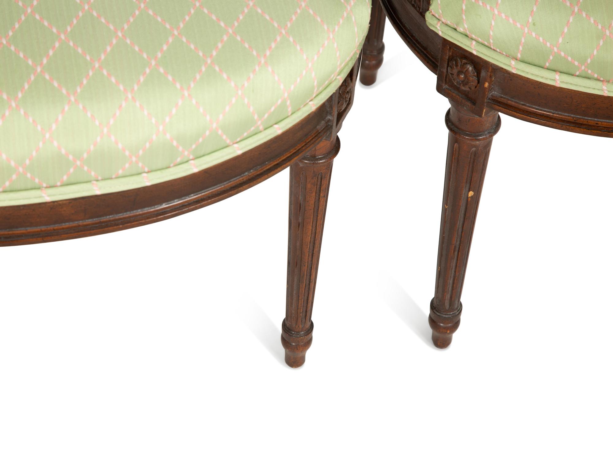 A Set of Four Louis XVI Style Mahogany "Montgolfière" Armchairs