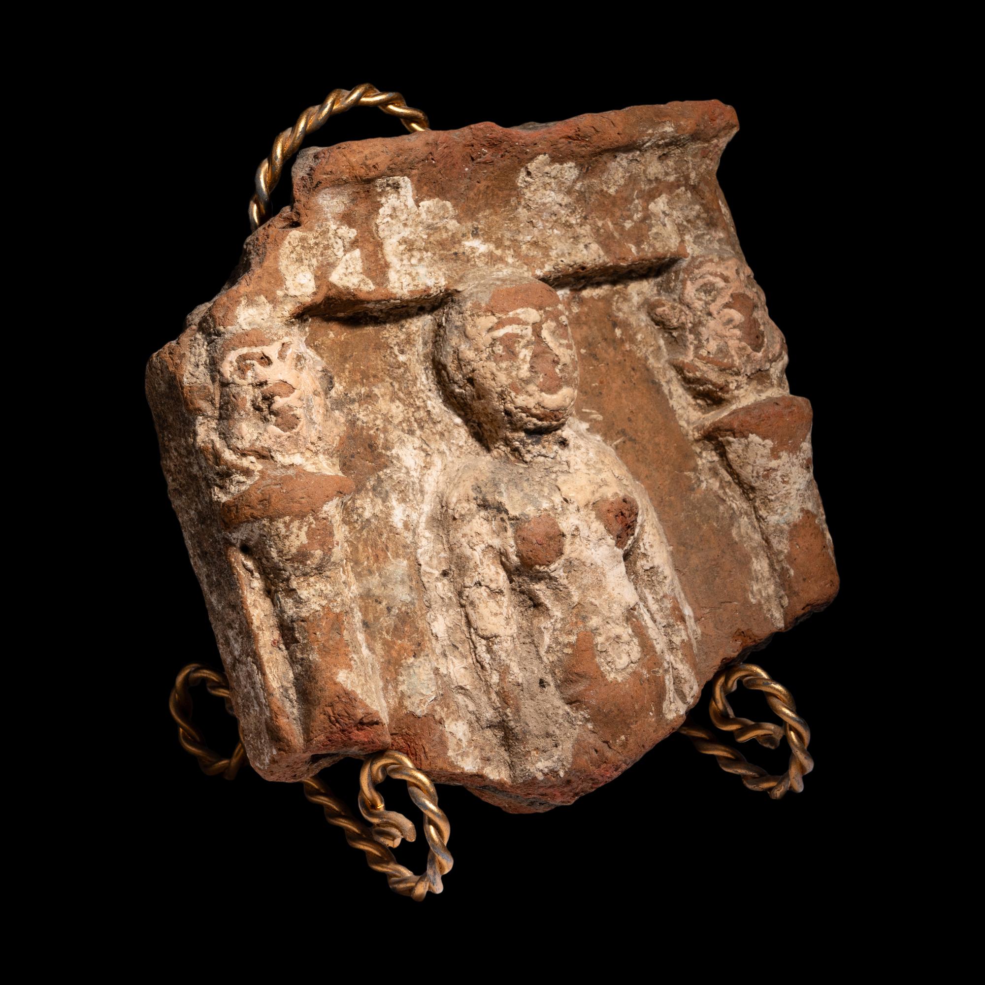 An Egyptian Terracotta Fragment with Concubine Flanked by Bes-Shaped Columns