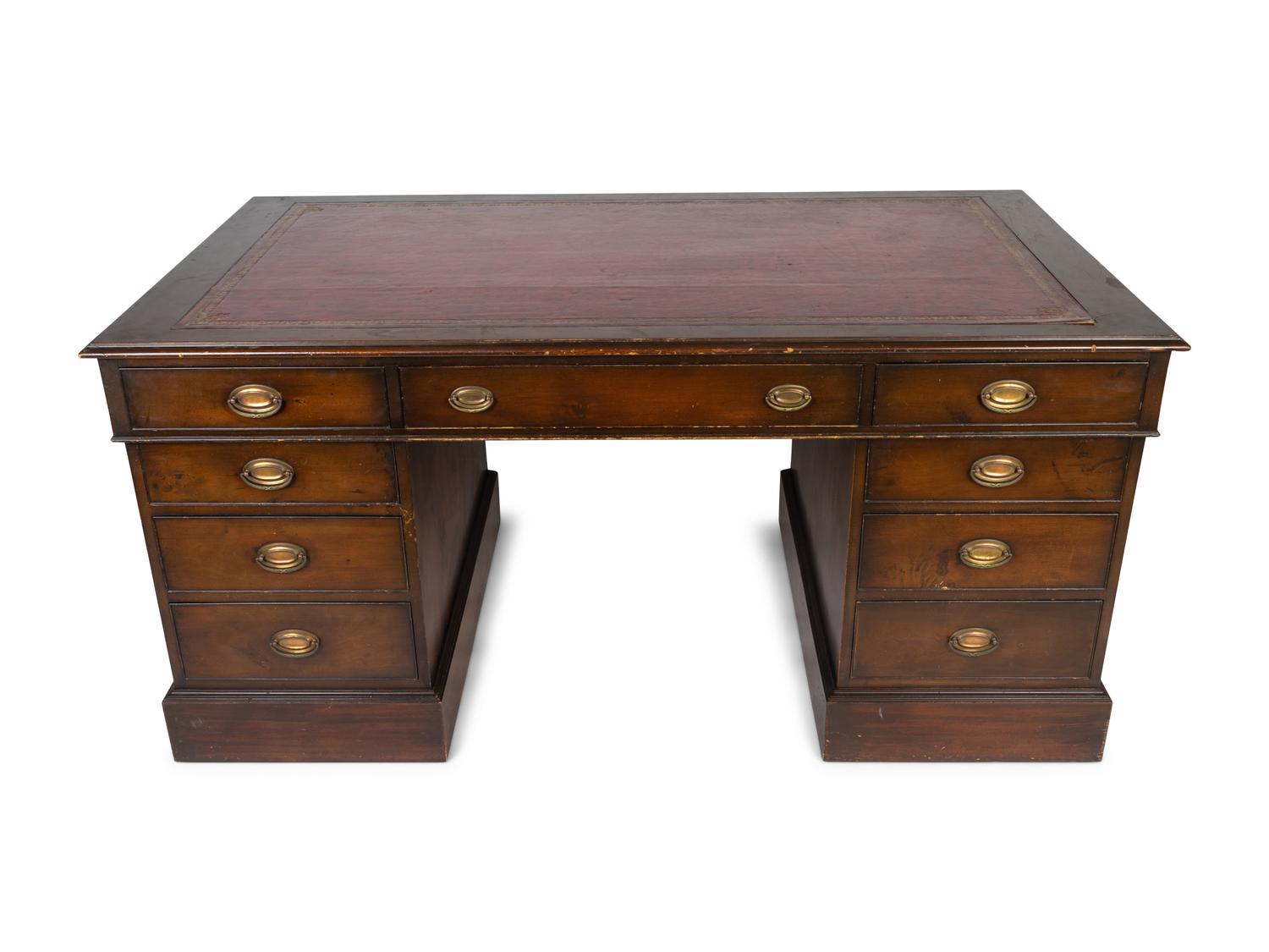 A George III Style Mahogany Partner's Desk — 19TH CENTURY