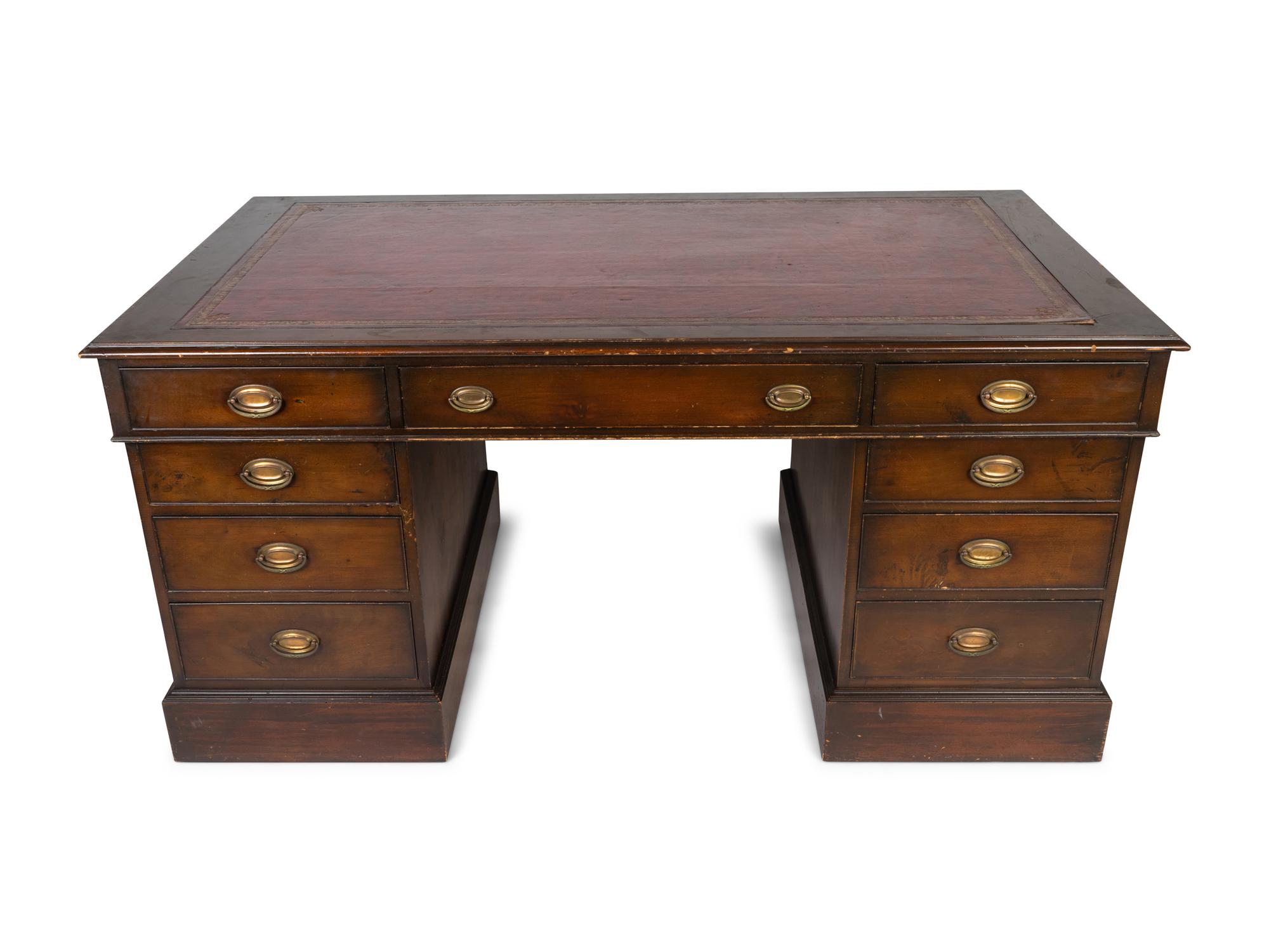 A George III Style Mahogany Partner's Desk — 19TH CENTURY