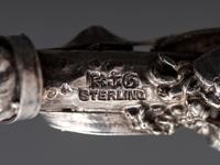 An American Parcel Gilt Silver Serving Spoon