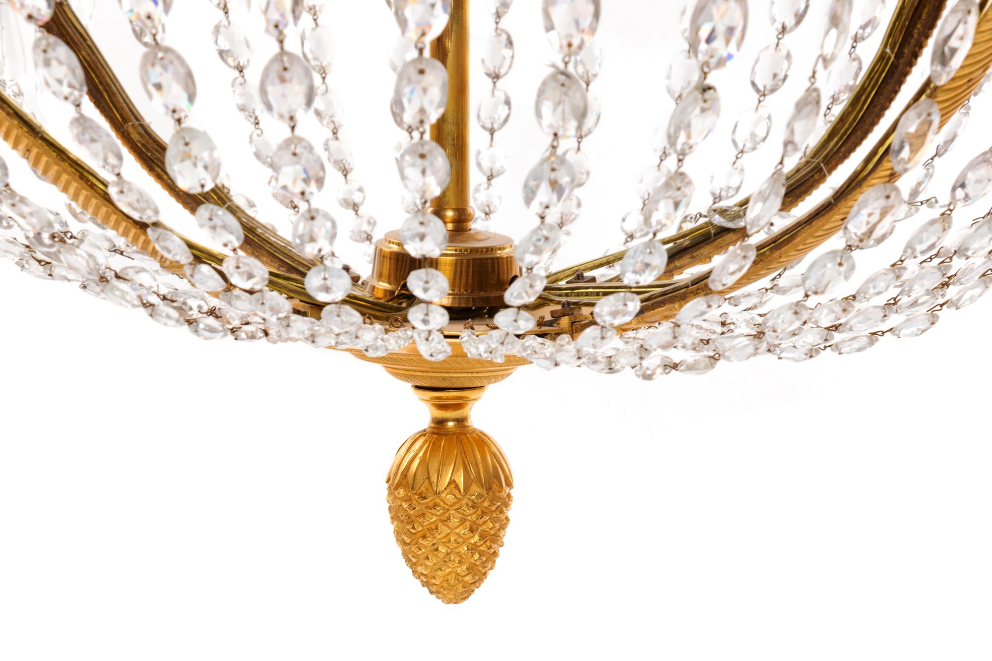 A Russian Empire Gilt Bronze and Cut Glass Sixteen-Light Chandelier