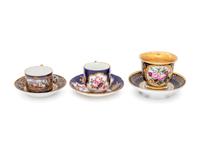 An Assembled Set of Six Sèvres Style Painted and Parcel Gilt Porcelain Teacups and Saucers