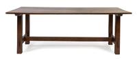 An American Arts and Crafts Oak Dining Table Height 30 x length 83 x depth 34 1/2 inches.