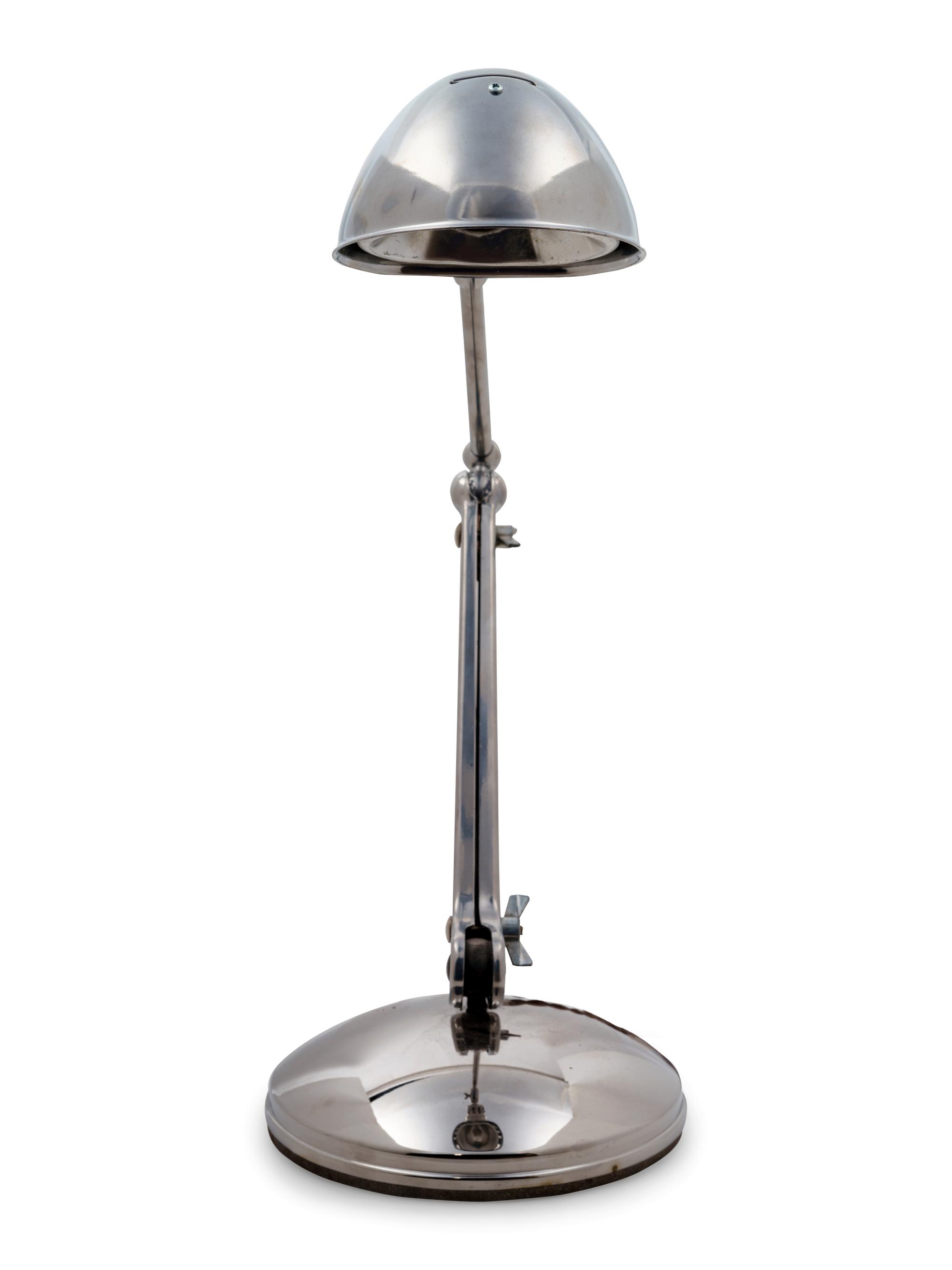 A Chromed Metal Articulated Desk Lamp