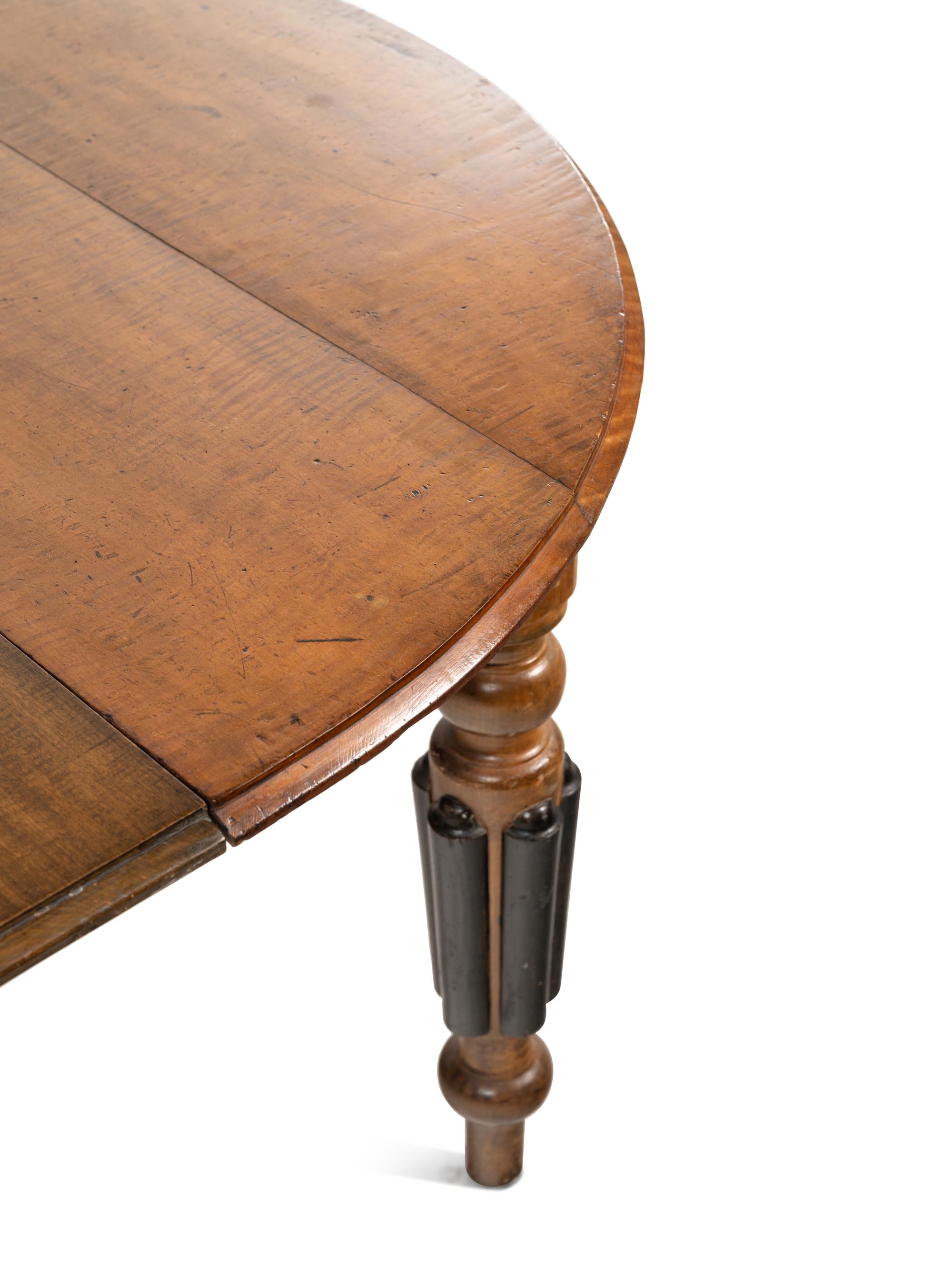 A Parcel Ebonized Maple Extension Dining Table
