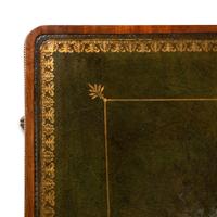 A Regency Mahogany, Ebony Inlaid and Ormolu Mounted Partner's Desk