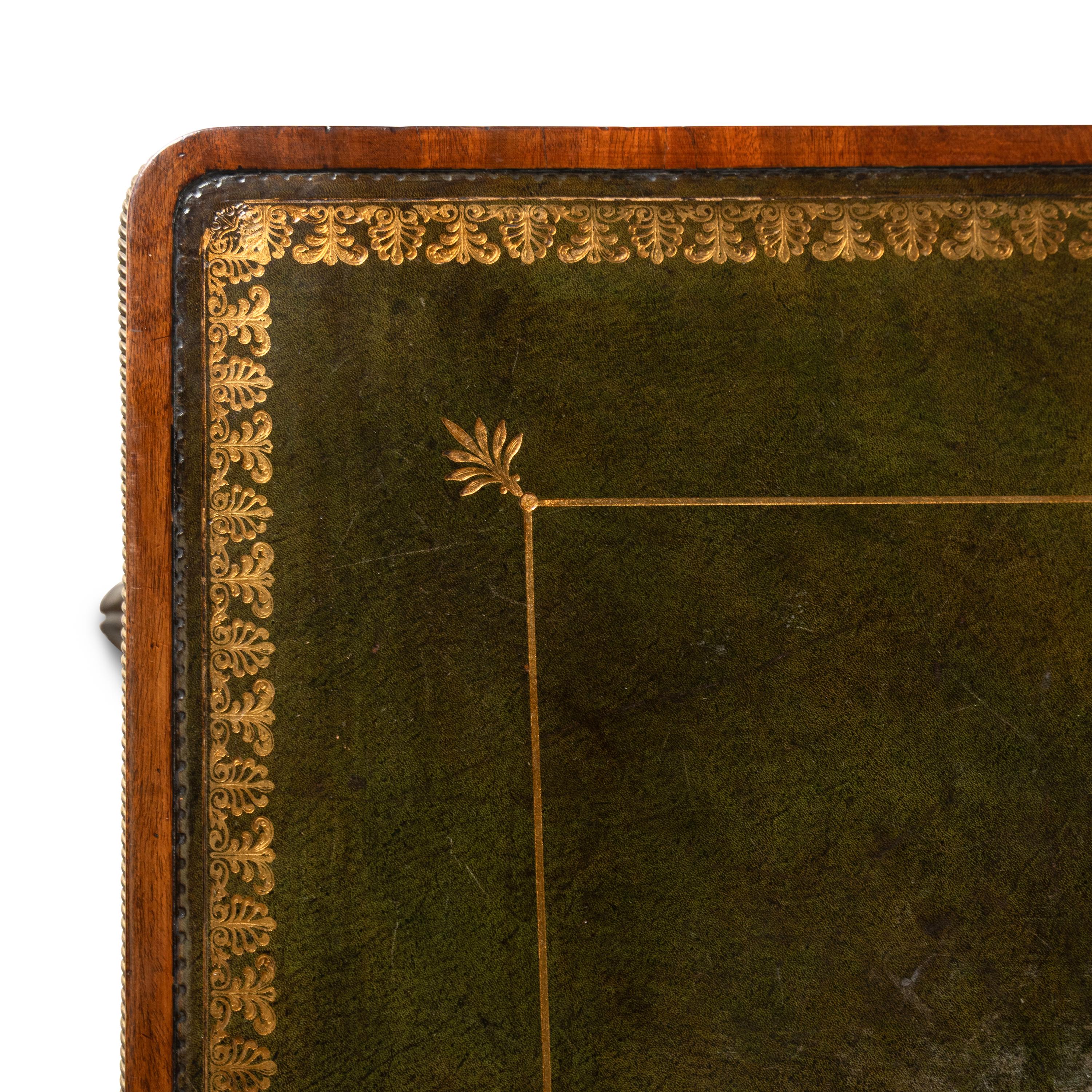 A Regency Mahogany, Ebony Inlaid and Ormolu Mounted Partner's Desk