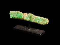 A Maya Jade Serpent Pendant