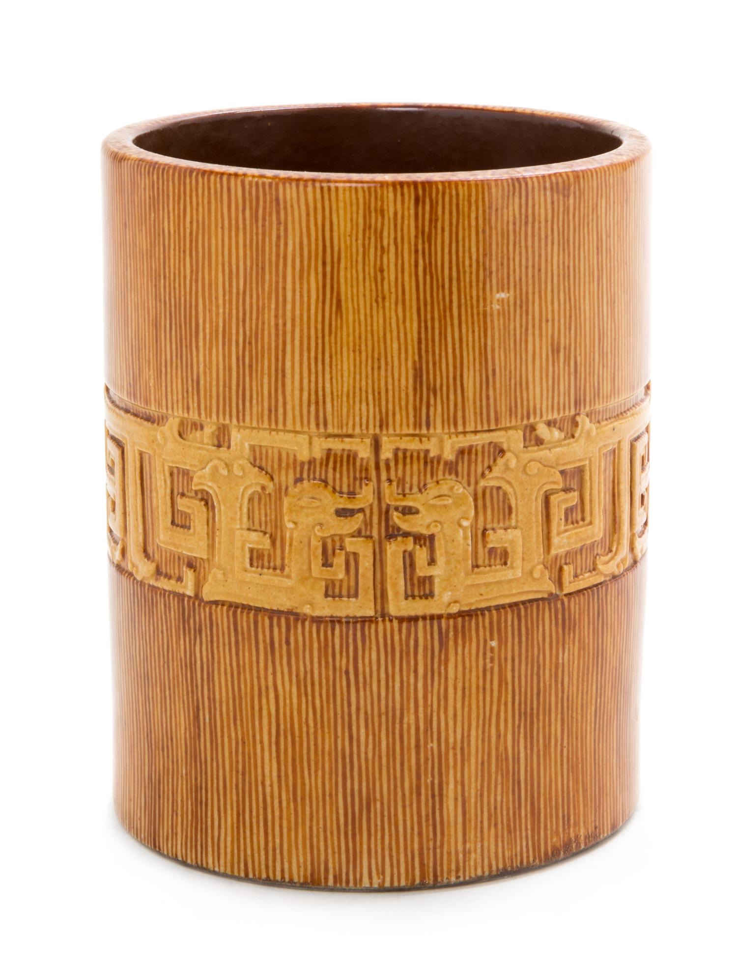 A Yellow Glazed Porcelain Brushpot Height 5 inches.
