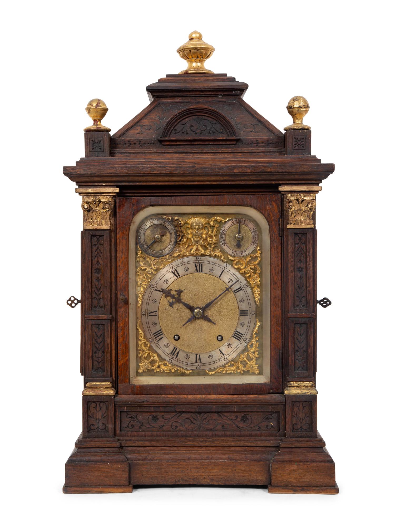 A Victorian Gilt Metal Mounted Oak Bracket Clock