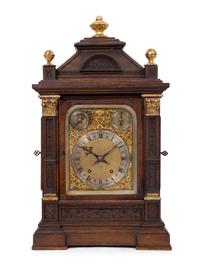 A Victorian Gilt Metal Mounted Oak Bracket Clock