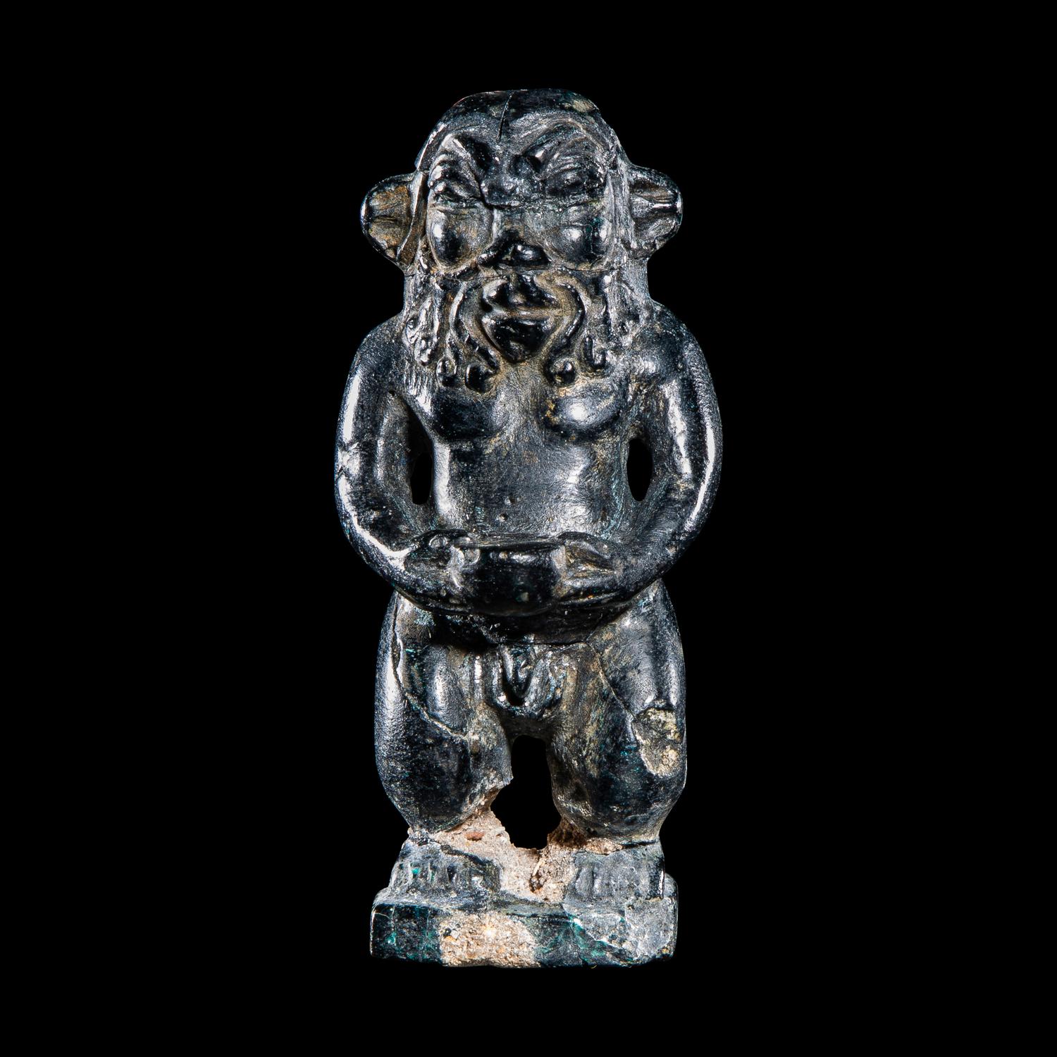 An Egyptian Glass Bes