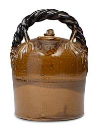 A Rhodenbaugh Stoneware Harvest Jug