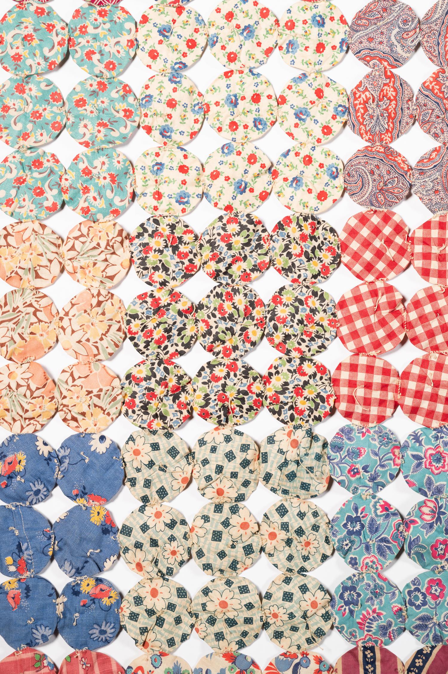 A Pieced Cotton Yo-Yo Quilt