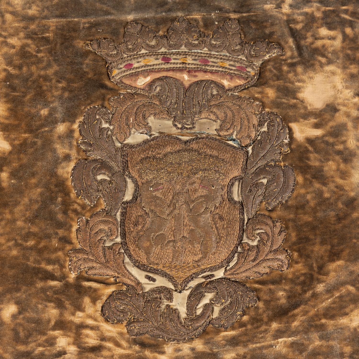 Two Velvet Panels with Silver Fil é Heraldic Crest Appliqués