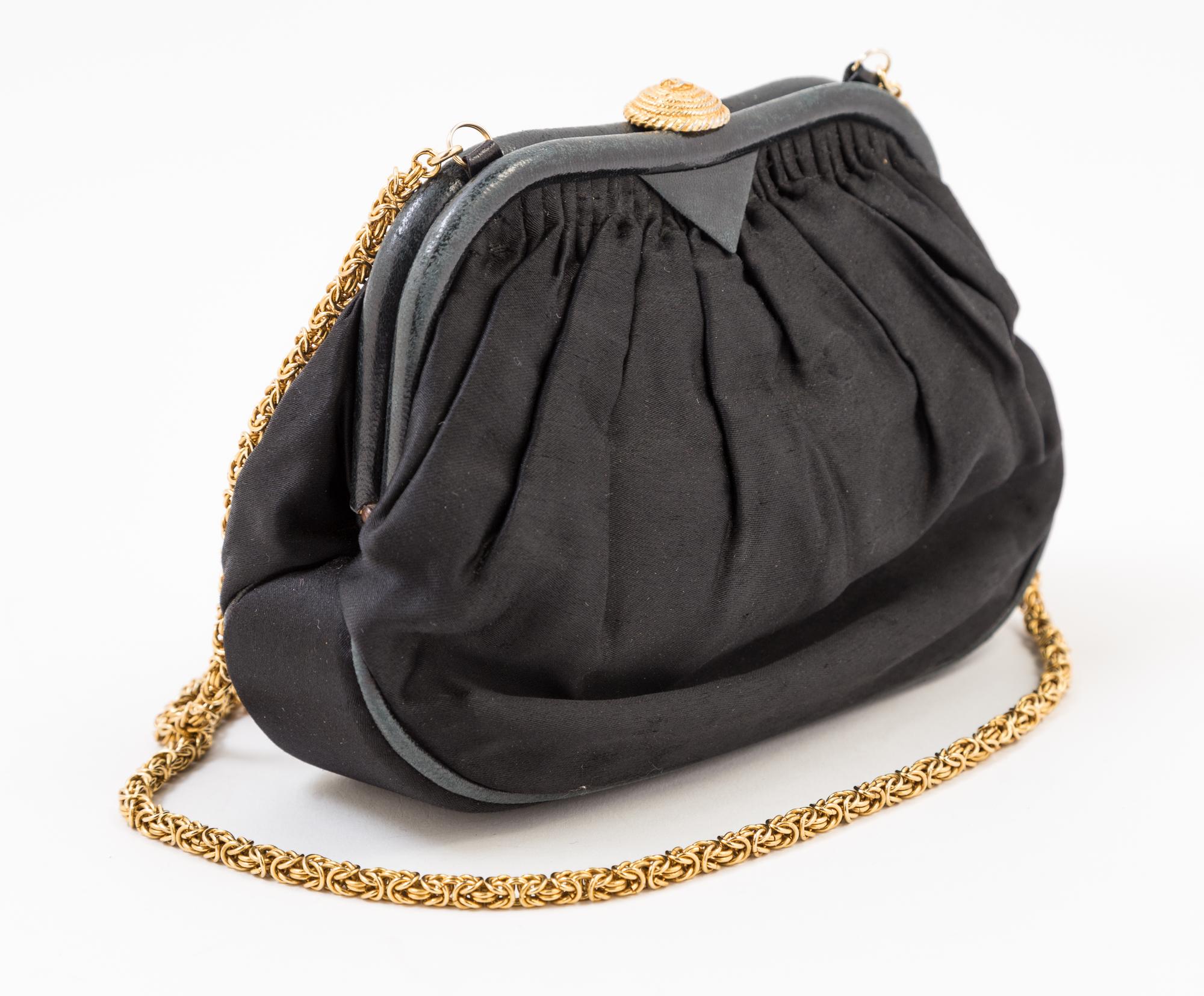 A Chanel Black Vintage Silk Evening Bag, 8" x 6" x 2".