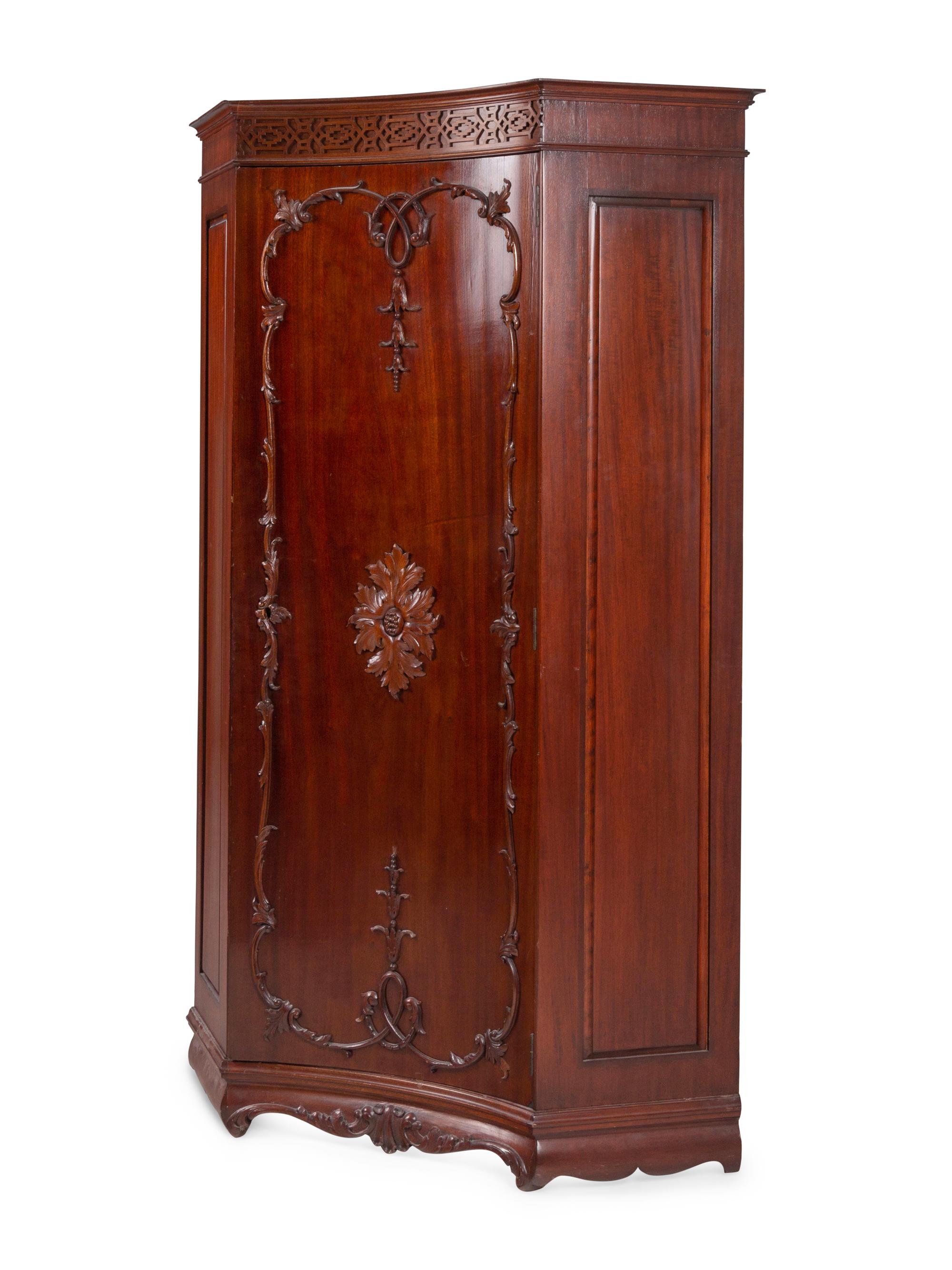 A George III Style Mahogany Corner Cabinet in the Chippendale Taste