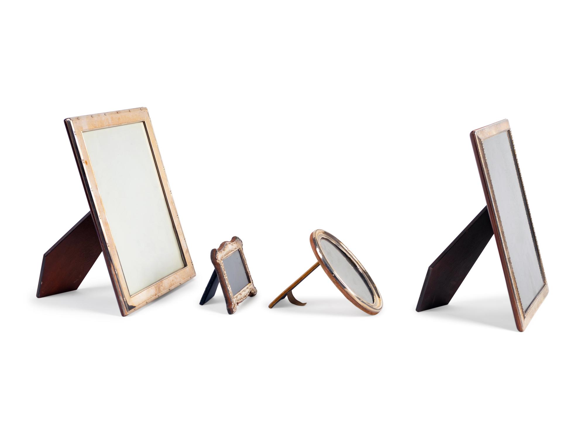 A Collection of Four Silver Picture Frames — 20TH CENTURY
