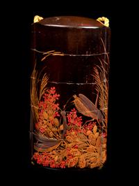A Gold and Black Lacquer Four-Case Inro