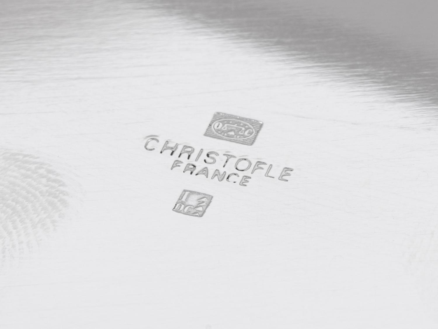 A Set of Ten Christofle Silver-Plate Chargers