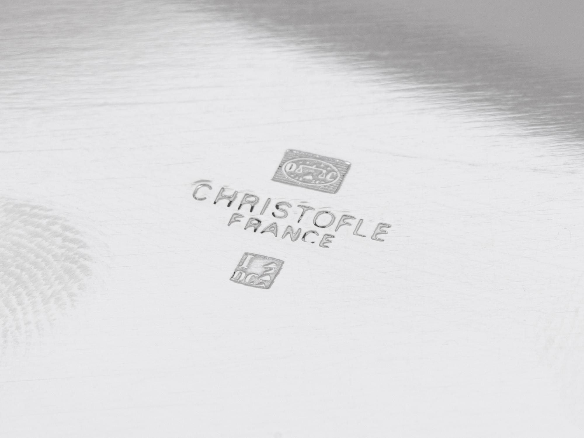 A Set of Ten Christofle Silver-Plate Chargers