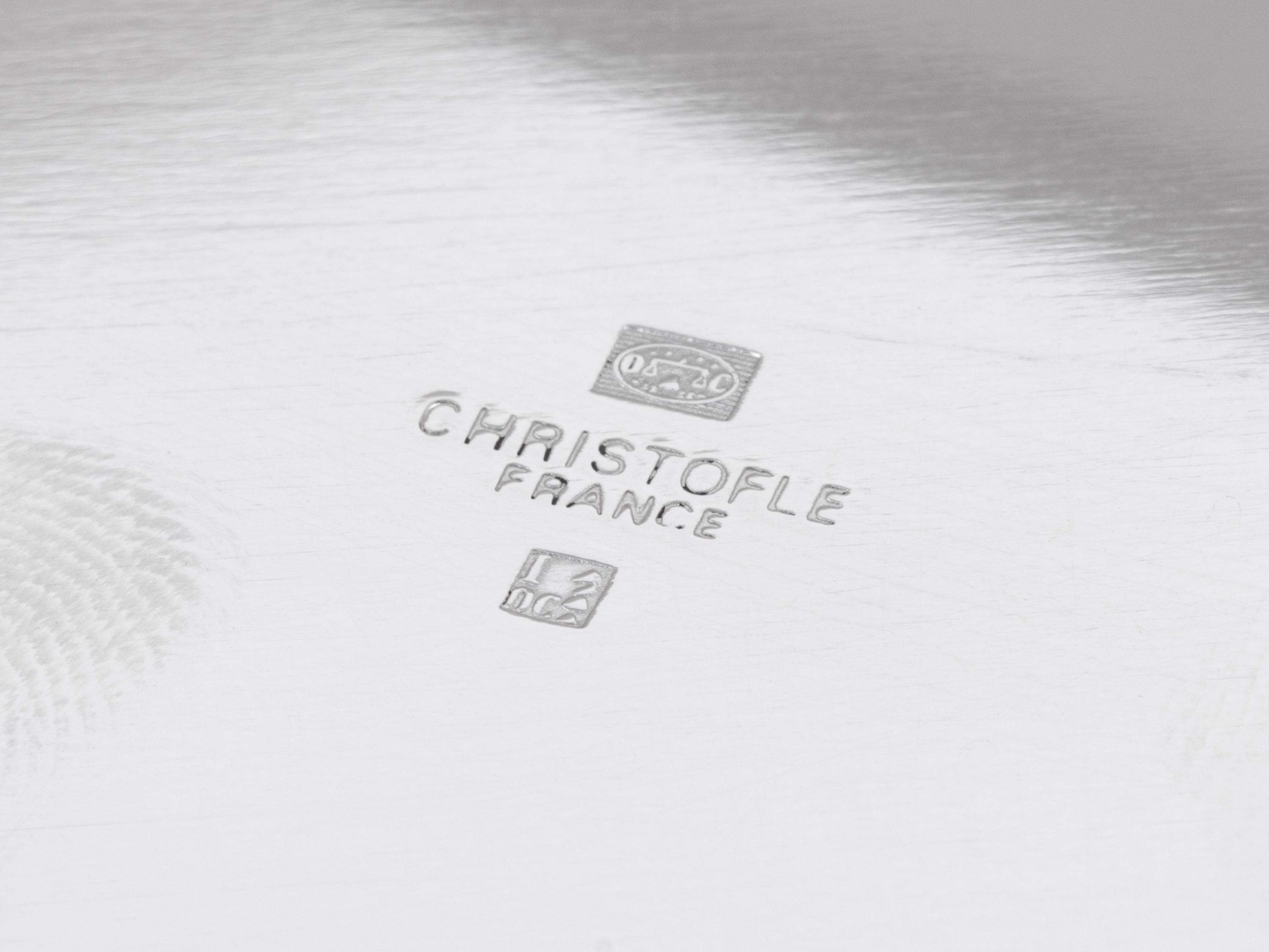 A Set of Ten Christofle Silver-Plate Chargers