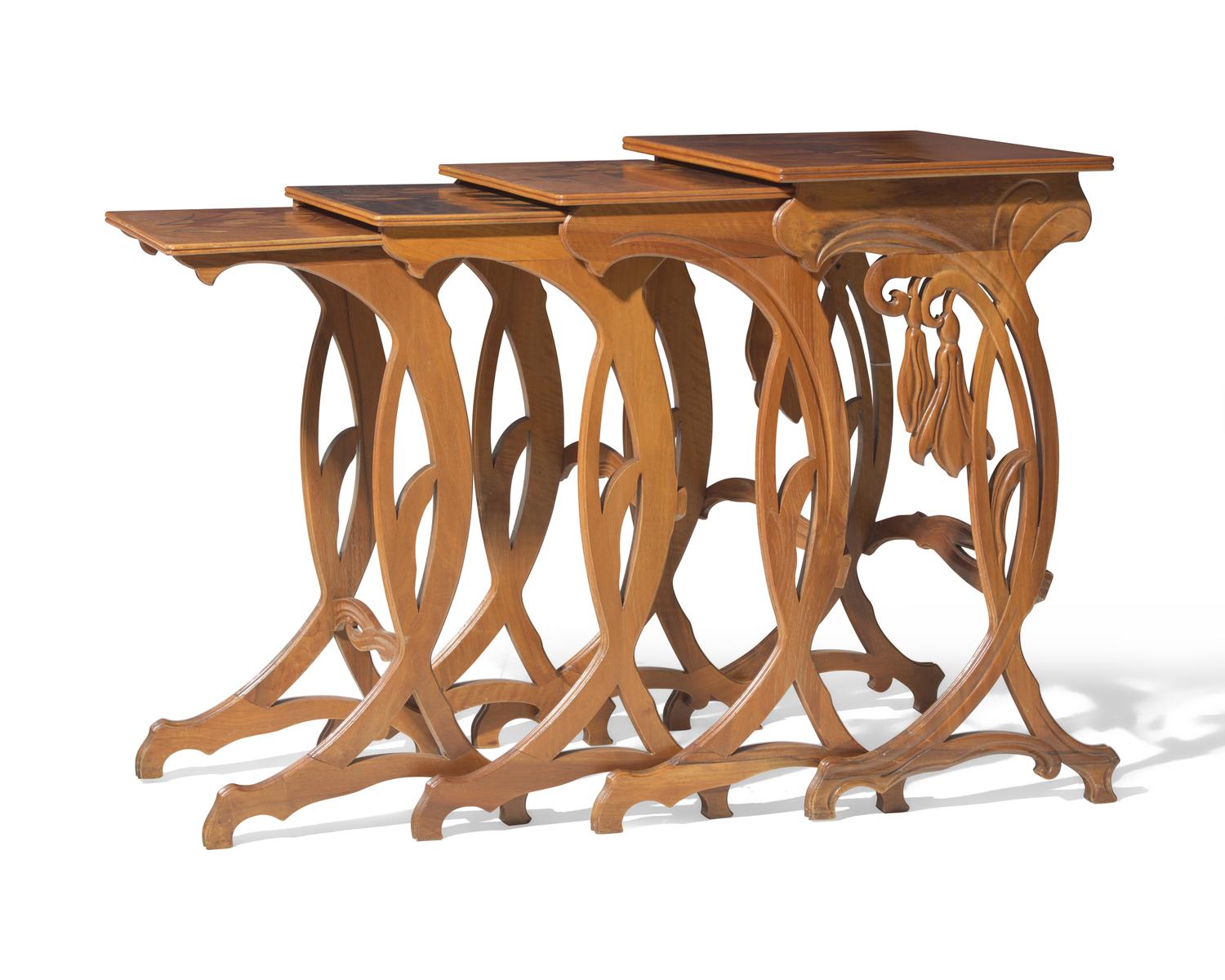 Émile Gallé (French, 1846-1904), A group of four Art Nouveau carved mahogany and marquetry nesting tables, circa 1900