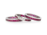 TIFFANY & CO., COLLECTION OF PLATINUM, RUBY, AND DIAMOND ETERNITY BAND RINGS