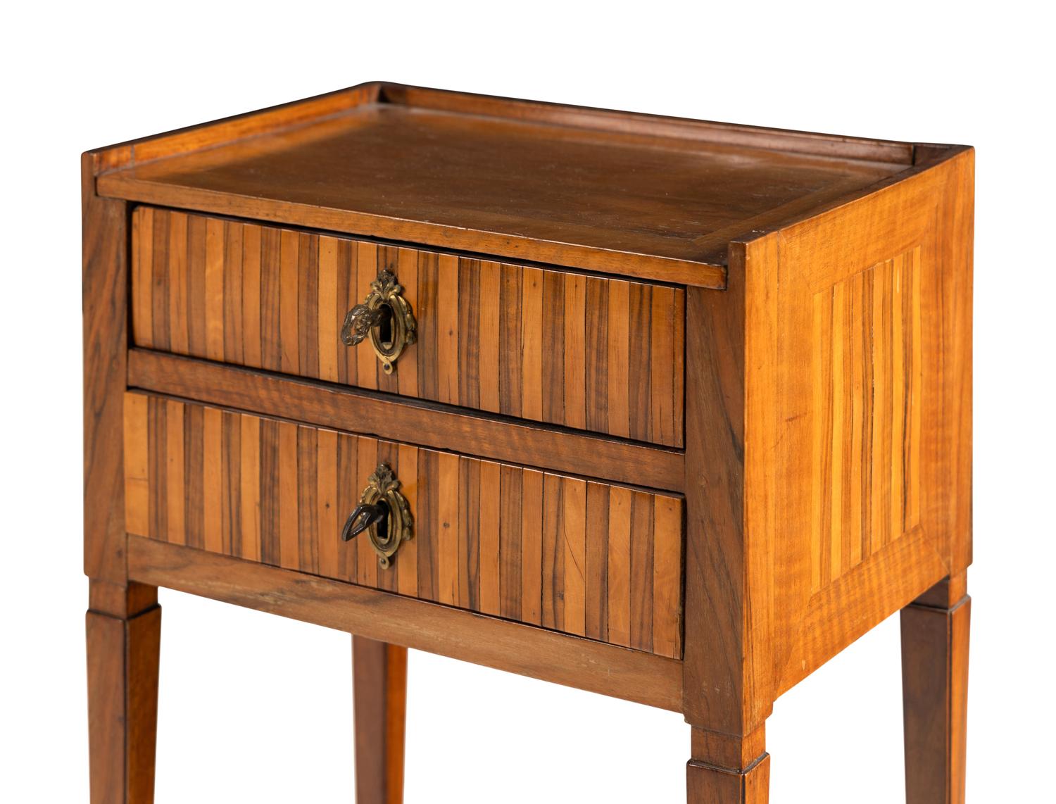 A Louis XVI Style Walnut and Fruitwood Side Table