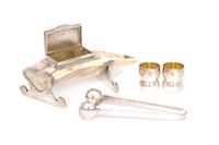 An English Silver Mounted Tusk , A. Barrett & Sons, London , together with a pair of Bulgari silver jiggers and a pair of Napier silver