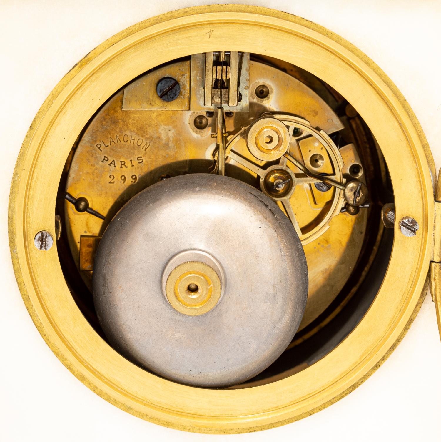 A French Gilt Bronze and Marble Clock