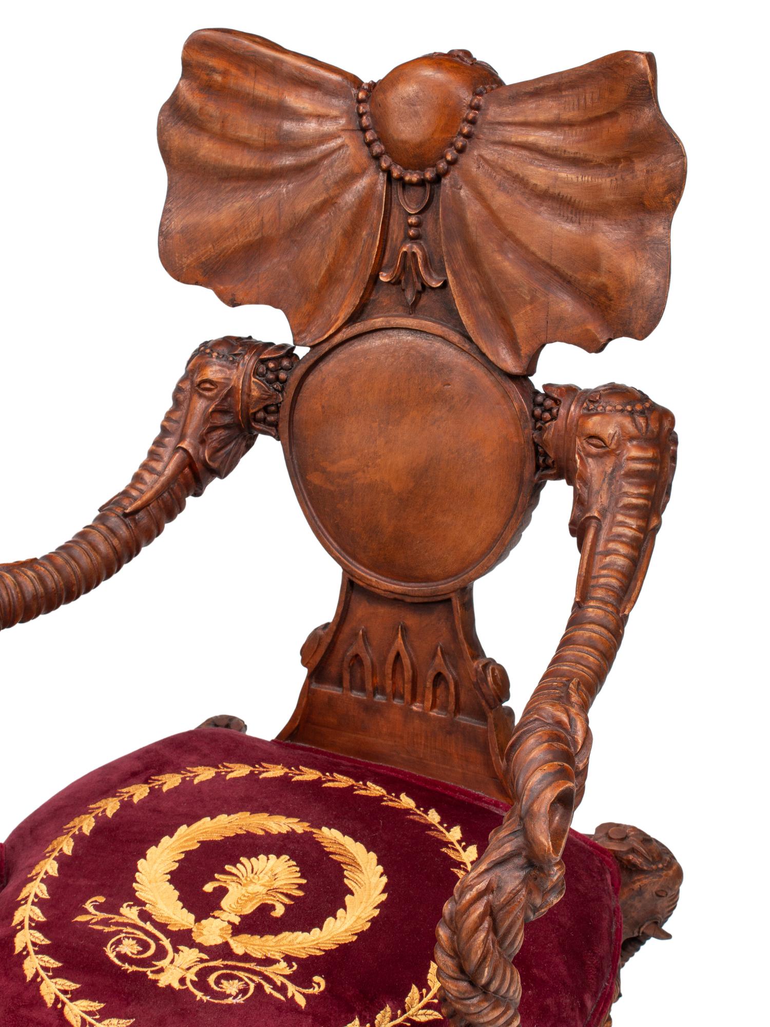 A Set of Four Carved Walnut Elephant Motif Fantasy Chairs