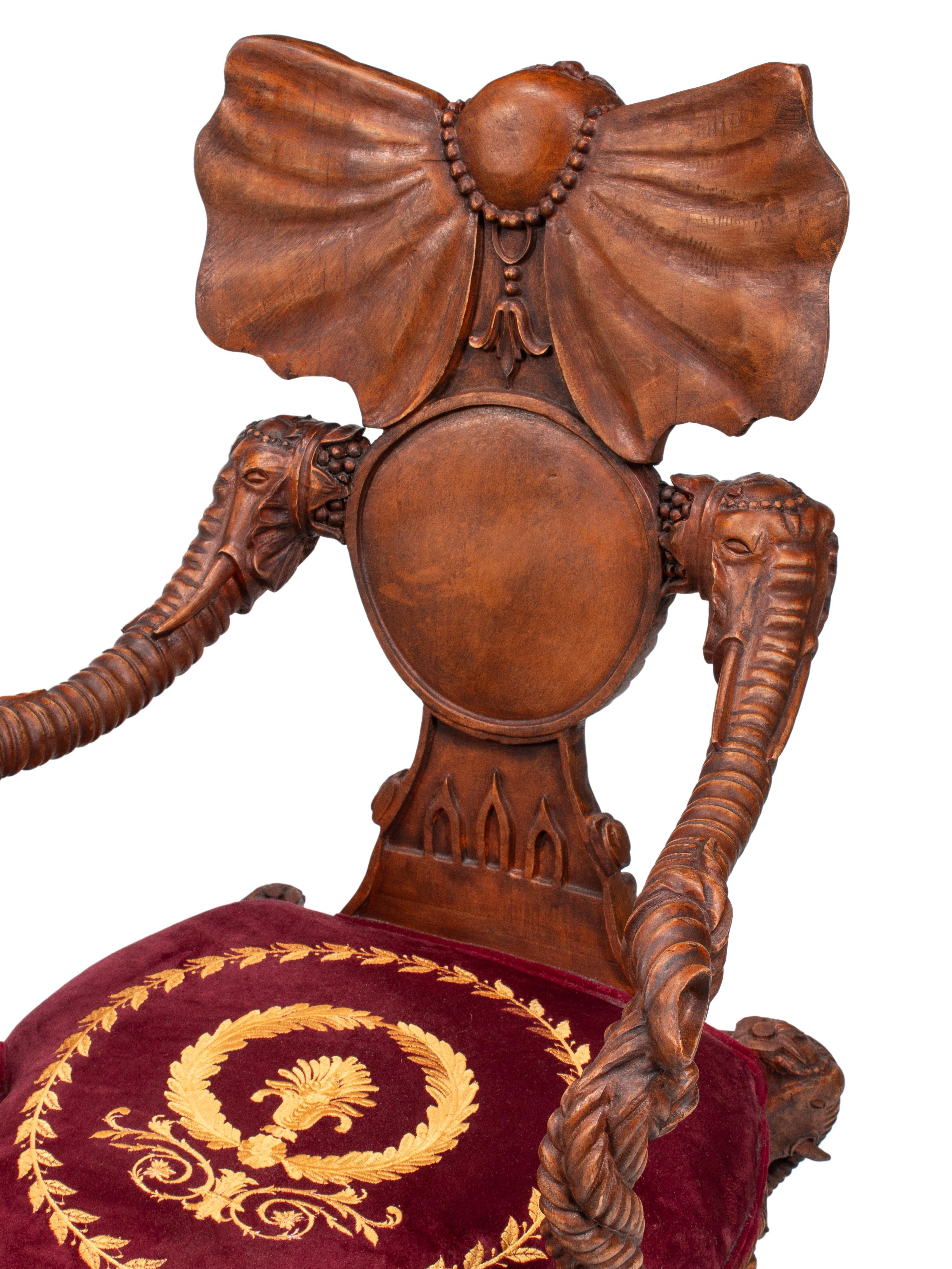 A Set of Four Carved Walnut Elephant Motif Fantasy Chairs